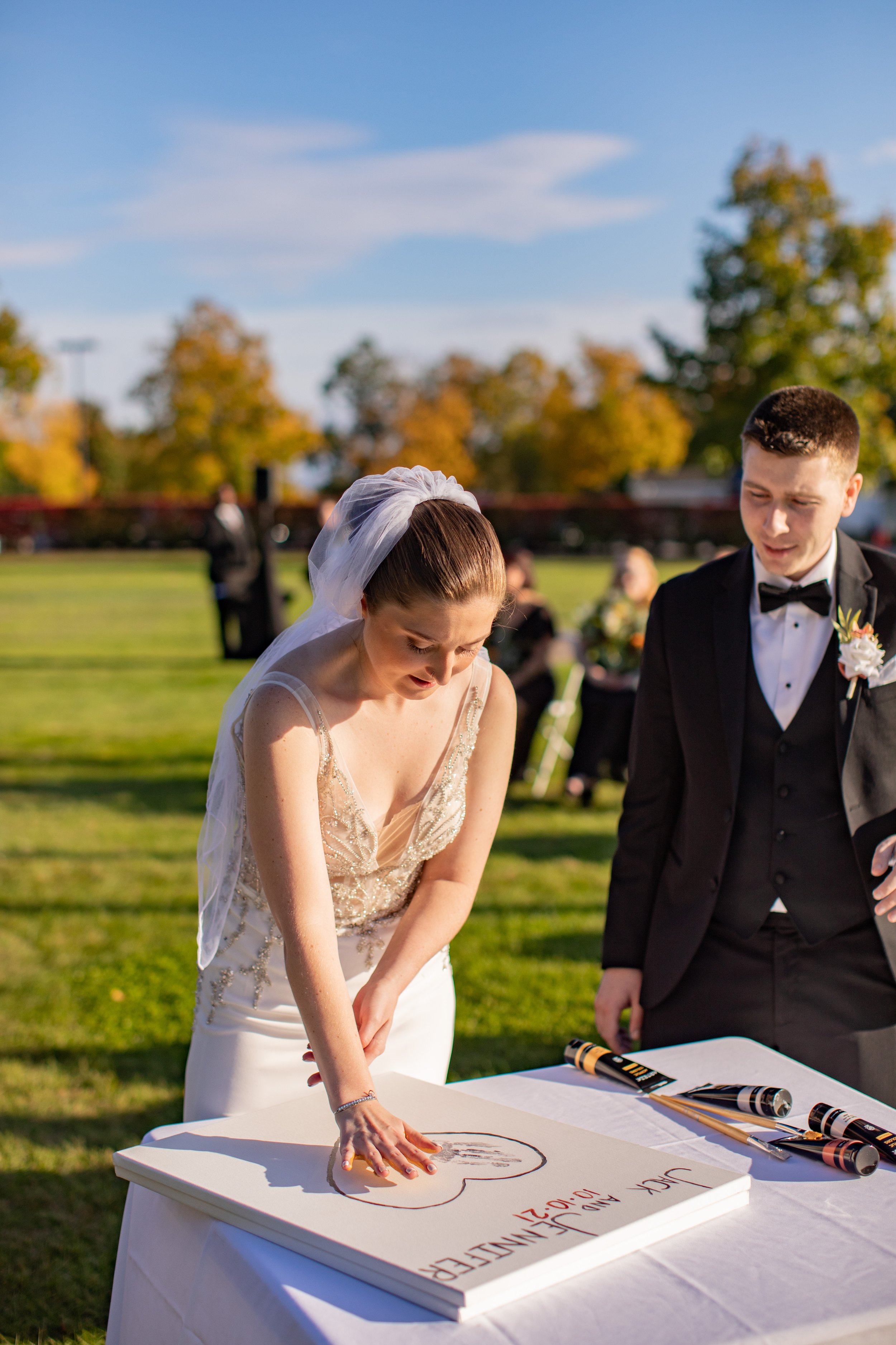 Handprinting unity ritual, Burlington, Vermont wedding. Martha Dallas, officiant
