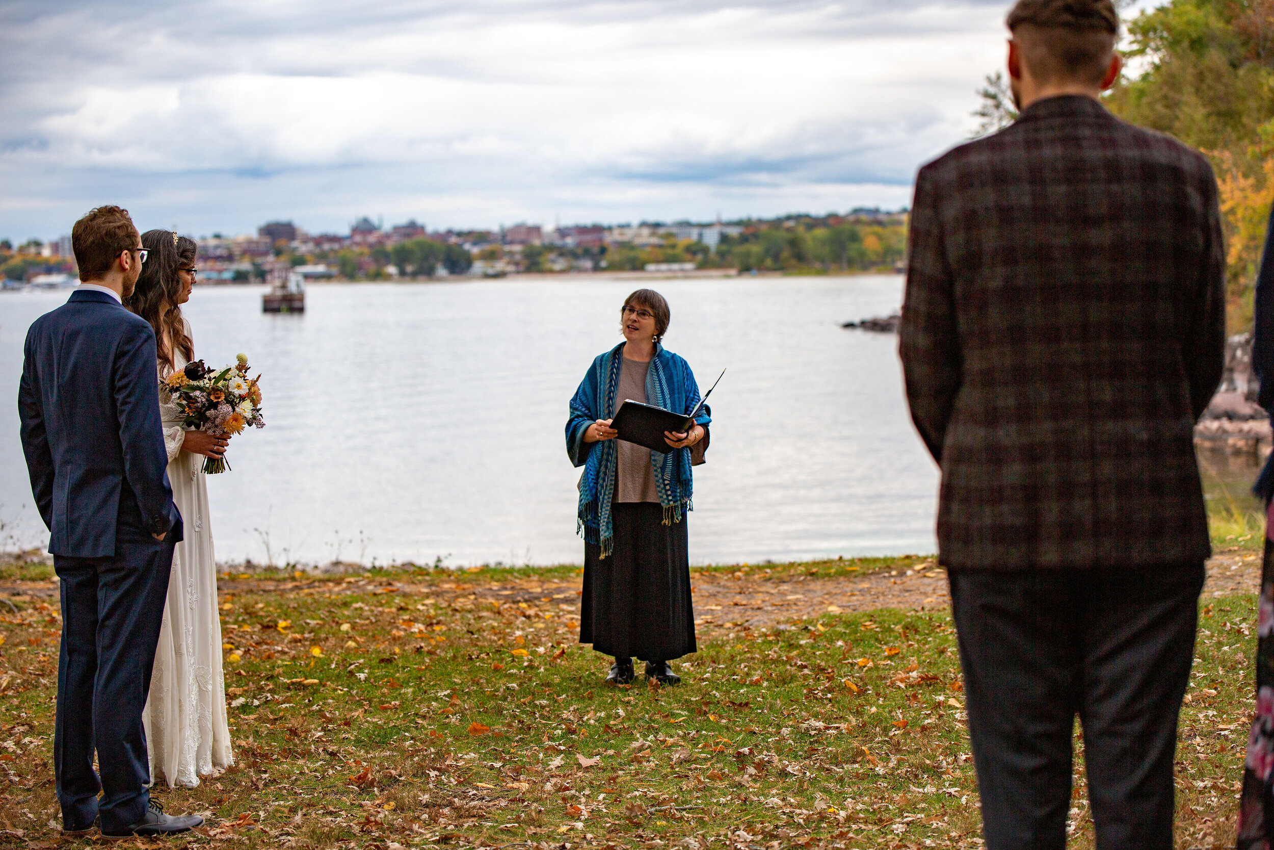 As a celebrant, I deliver some elements of the ceremony from the side, so the couple can be the focal point. Image by Barbee of Owl’s Iris Photography.