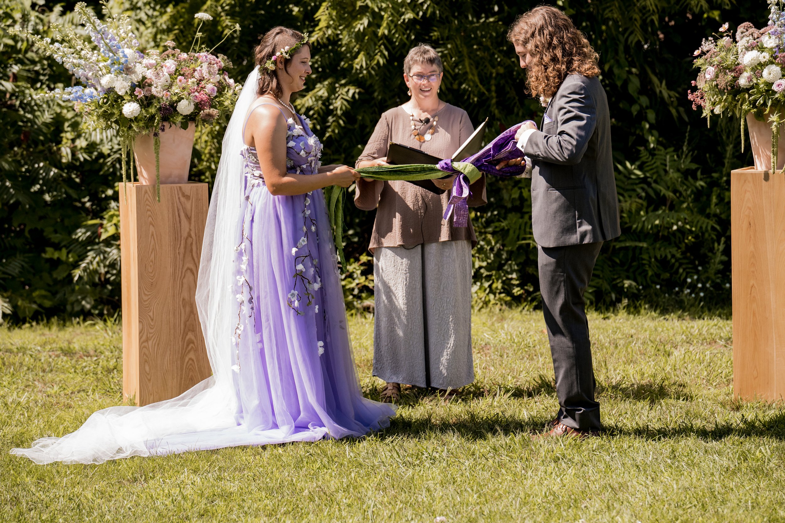 Handfasting ritual, Burlington, Vermont wedding. Martha Dallas, officiant
